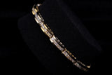 14K TWO-TONE GOLD 3.75 CTW LADIES CHANNEL-SET ROUND DIAMOND BRACELET 7.75"