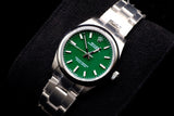 ROLEX OYSTER PERPETUAL 31MM OYSTERSTEEL GREEN DIAL SMOOTH BEZEL OYSTER BRACELET 277200