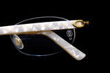 CARTIER C DÉCOR CT0056O-002 RIMLESS EYEGLASSES 52MM GOLD & PEARL WHITE