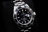 ROLEX SUBMARINER DATE 40MM STAINLESS STEEL BLACK DIAL BLACK BEZEL OYSTER BRACELET 16610