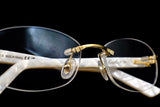 CARTIER C DÉCOR CT0056O-002 RIMLESS EYEGLASSES 52MM GOLD & PEARL WHITE