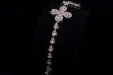 14K WHITE GOLD 4.25 CTW LADIES BAGUETTE & ROUND DIAMOND FLOWER BRACELET 7"