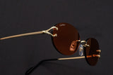 CARTIER SPLIT C CT0551S-005 RIMLESS SUNGLASSES 55MM GOLD-TONE RED GRADIENT FACTORY LENSES