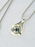 Tiffany & Co 18k Gold Sterling and Hematite Pendant + Chain